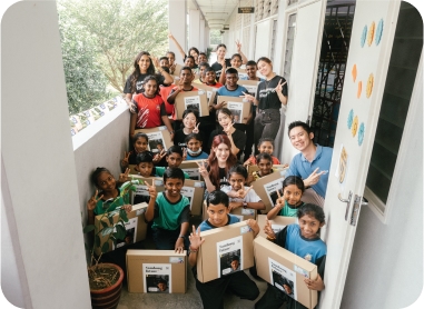 children's holding laptop